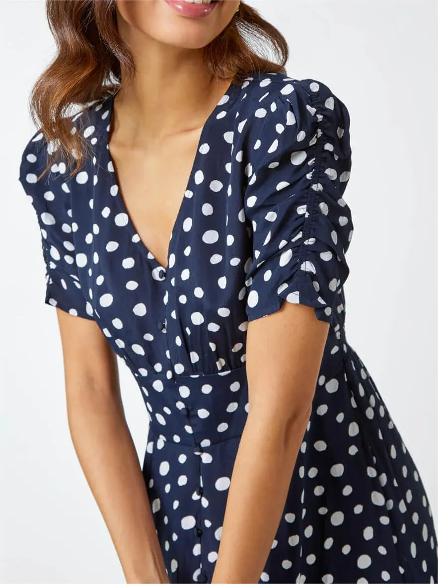 V-neck polka dot button dress