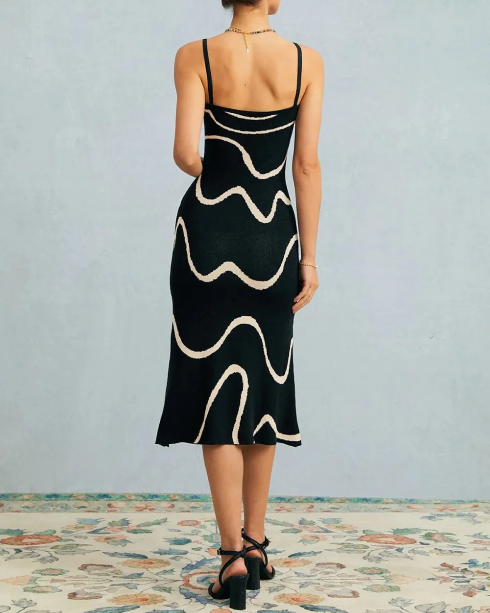 Black and white suspender ripple dress