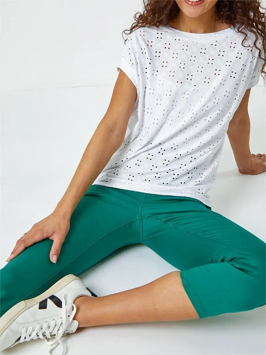 Green skinny trousers