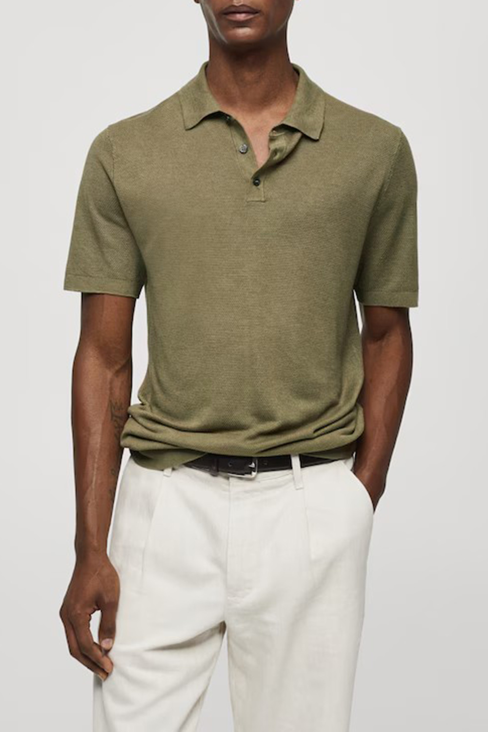 Buttoned micro-structure knitted polo shirt