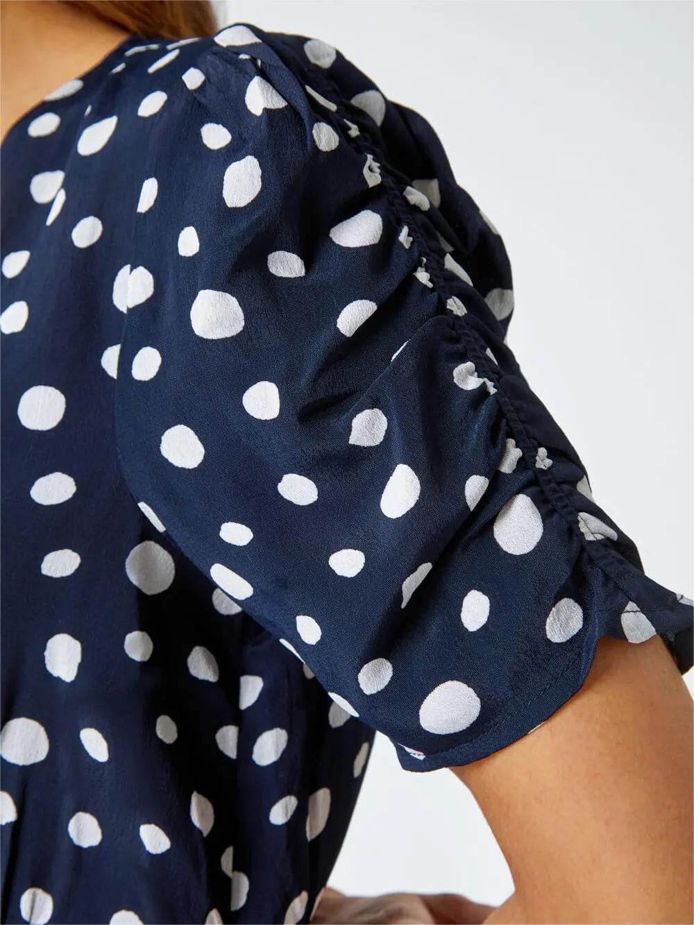 V-neck polka dot button dress