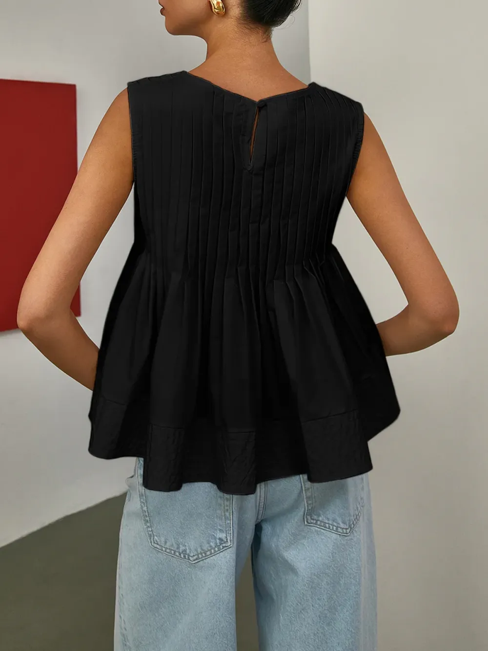 Pleated Peplum Sleeveless Blouse