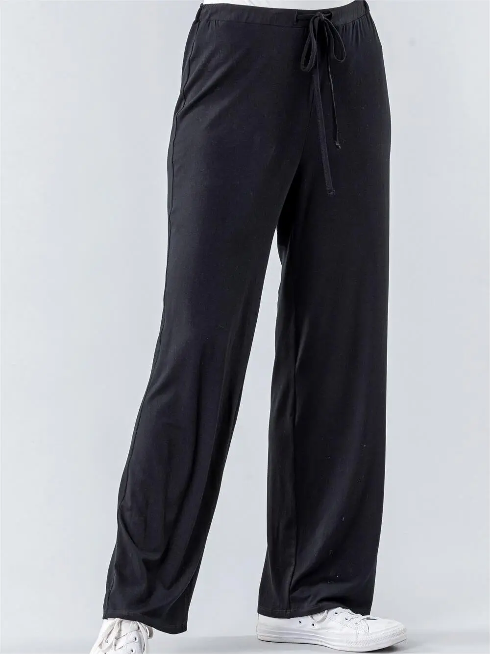 Thin draped black trousers